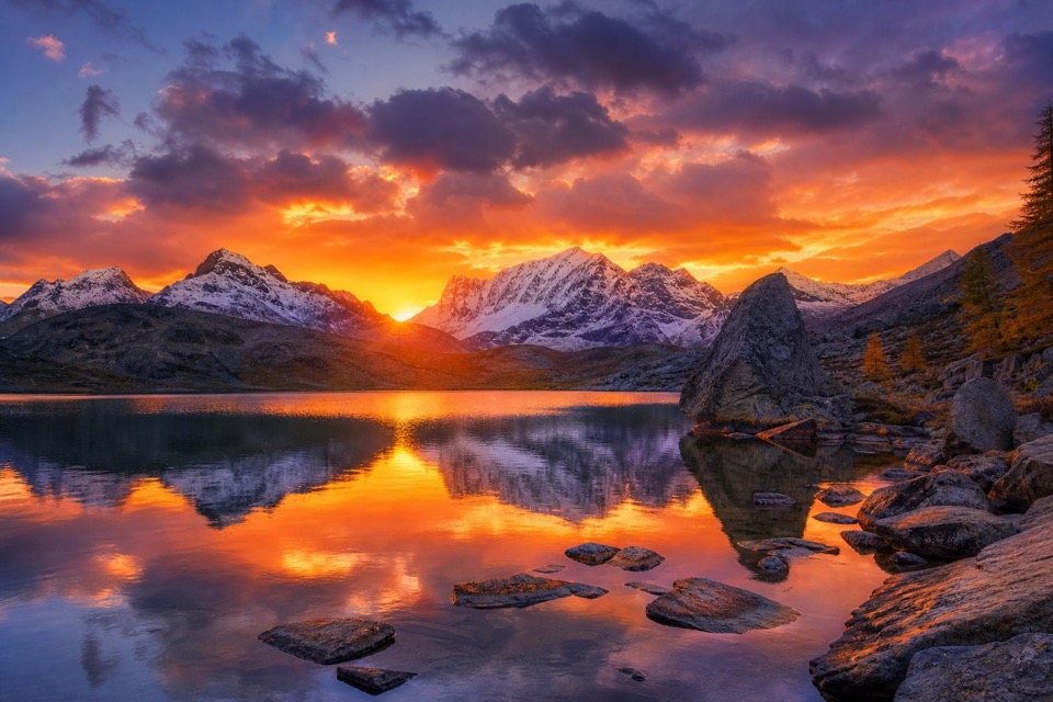 Sample AI-generated hero background of a mountain lake at sunset